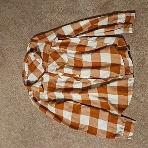 Flannel long sleeved shirt.